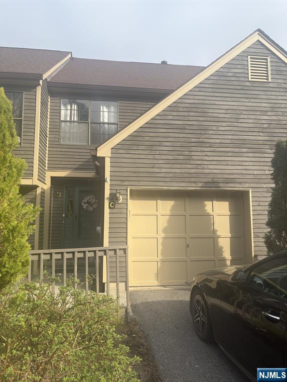 51 Beacon Hill Road, Unit C West Milford, NJ 07480 - Photo 1 of 31 a front view of a house with a parking space