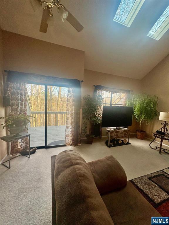 51 Beacon Hill Road, Unit C West Milford, NJ 07480 - Photo 13 of 31 a living room with furniture and a flat screen tv
