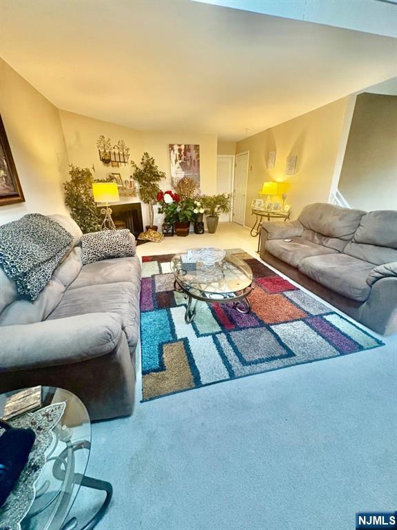 51 Beacon Hill Road, Unit C West Milford, NJ 07480 - Photo 15 of 31 a living room with furniture and a large window