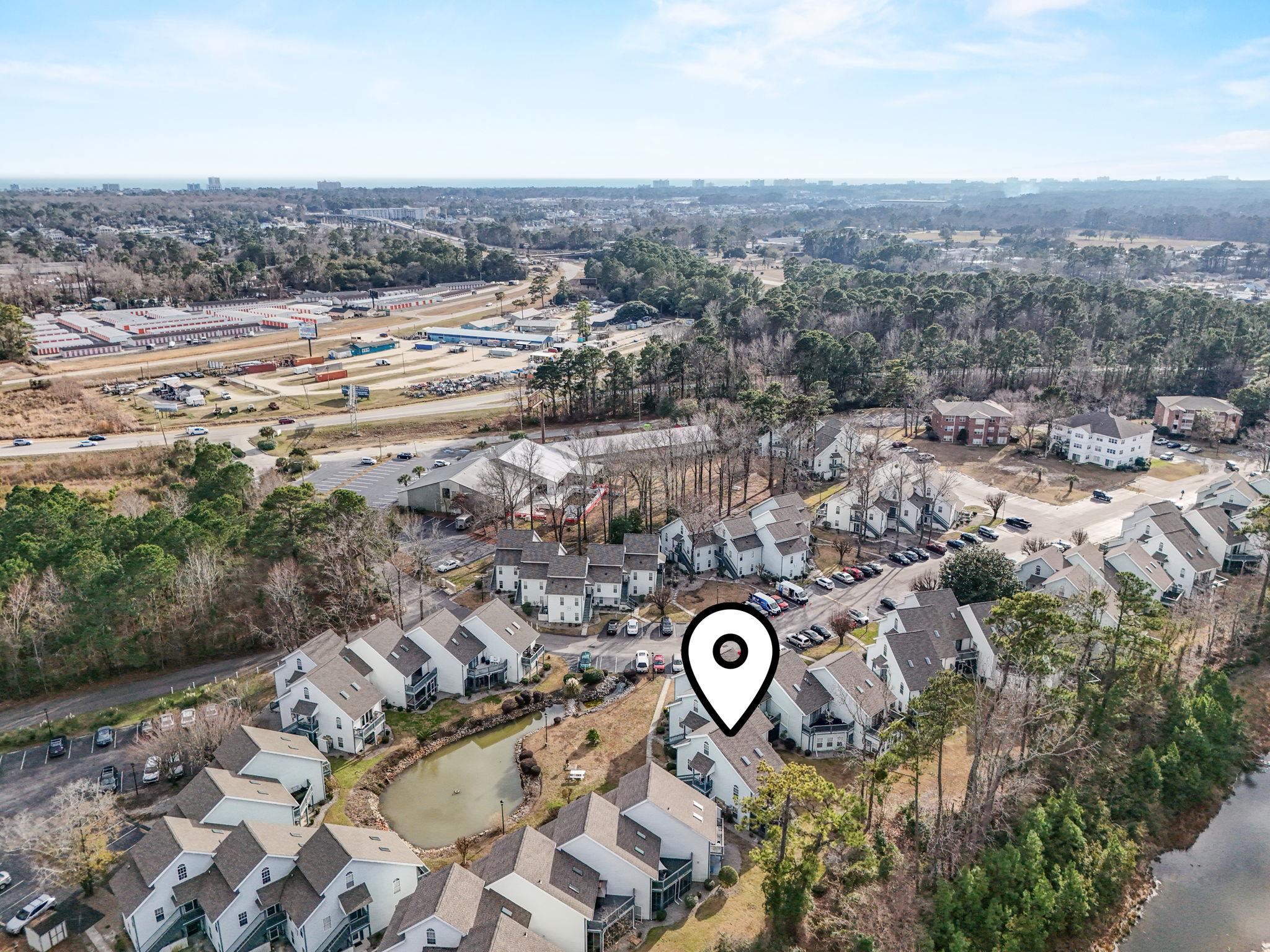 4353 Spa Drive, Unit 909 Little River, SC 29566 - Photo 34 of 39 Aerial view of property's location featuring nearby suburban area