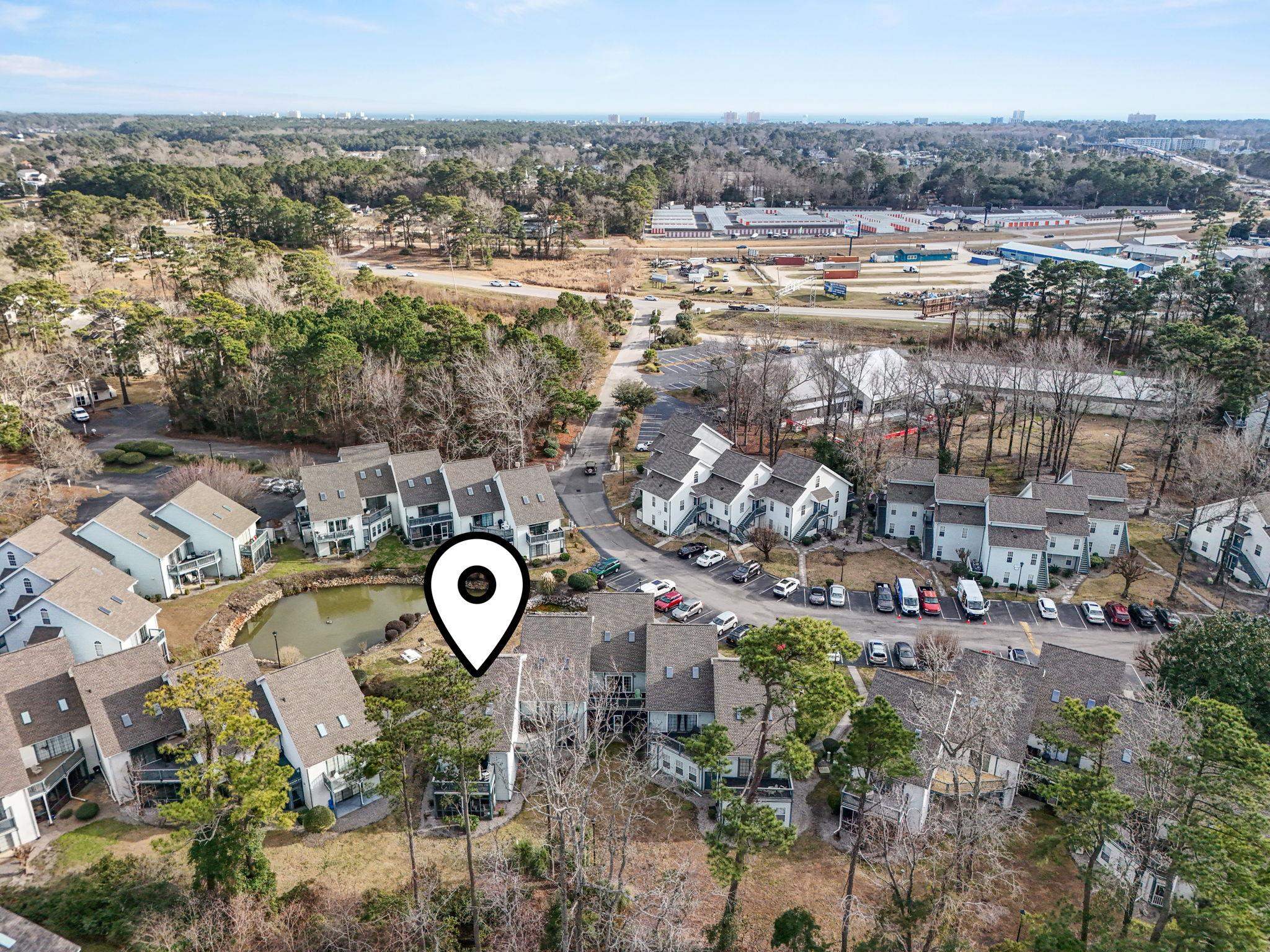 4353 Spa Drive, Unit 909 Little River, SC 29566 - Photo 35 of 39 Aerial view of property's location featuring nearby suburban area