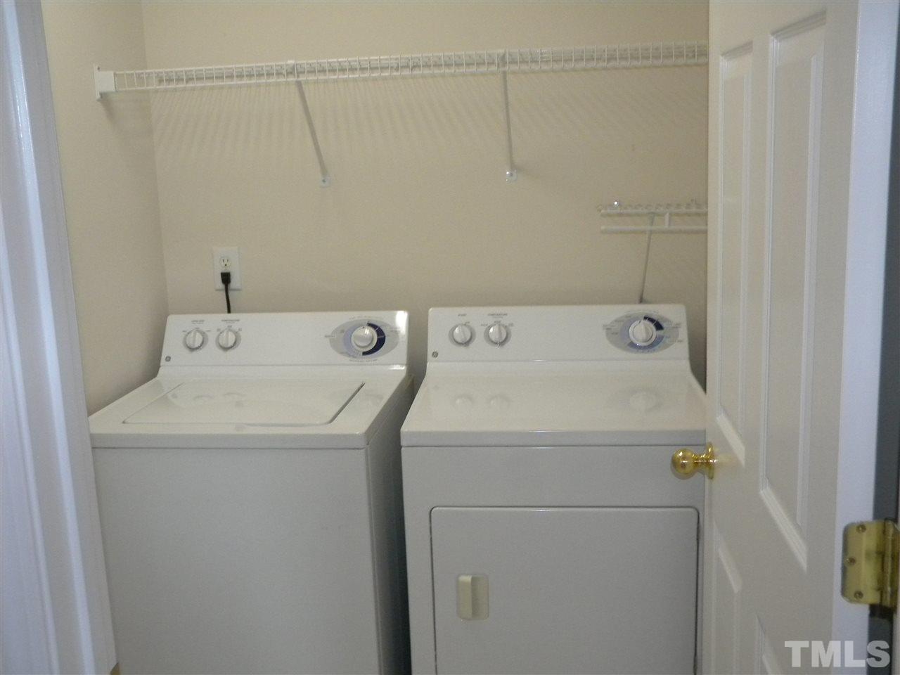 108 Rock River Road Morrisville, NC 27560 - Photo 21 of 25 a utility room with dryer and washer