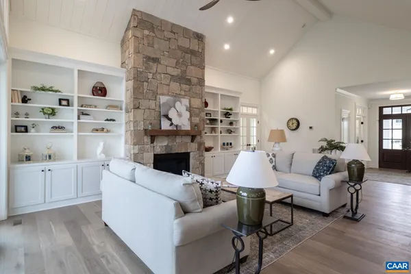 a kitchen with a sink and chandelier