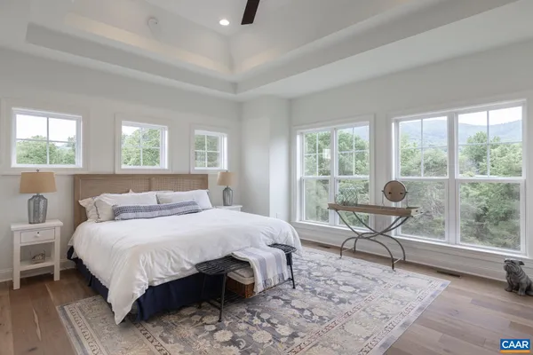 a en suite bathroom with double vanity and a mirror