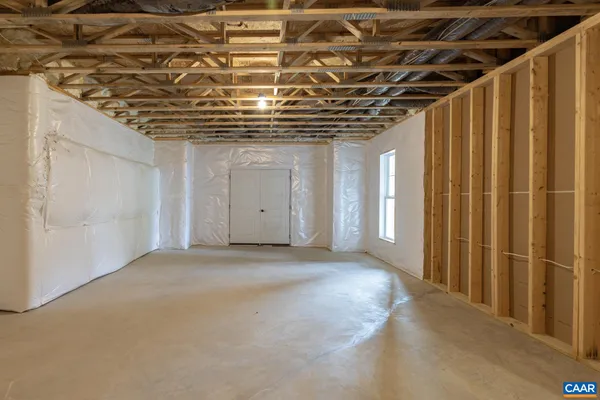 a view of a balcony with a yard