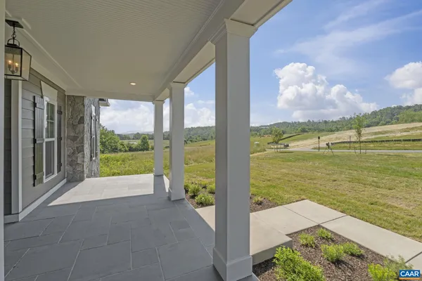 an aerial view of houses with yard