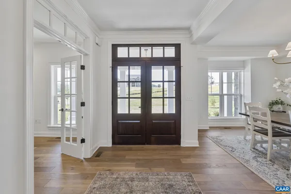 a view of balcony with wooden floor