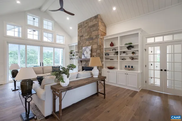 a view of a balcony with wooden floor