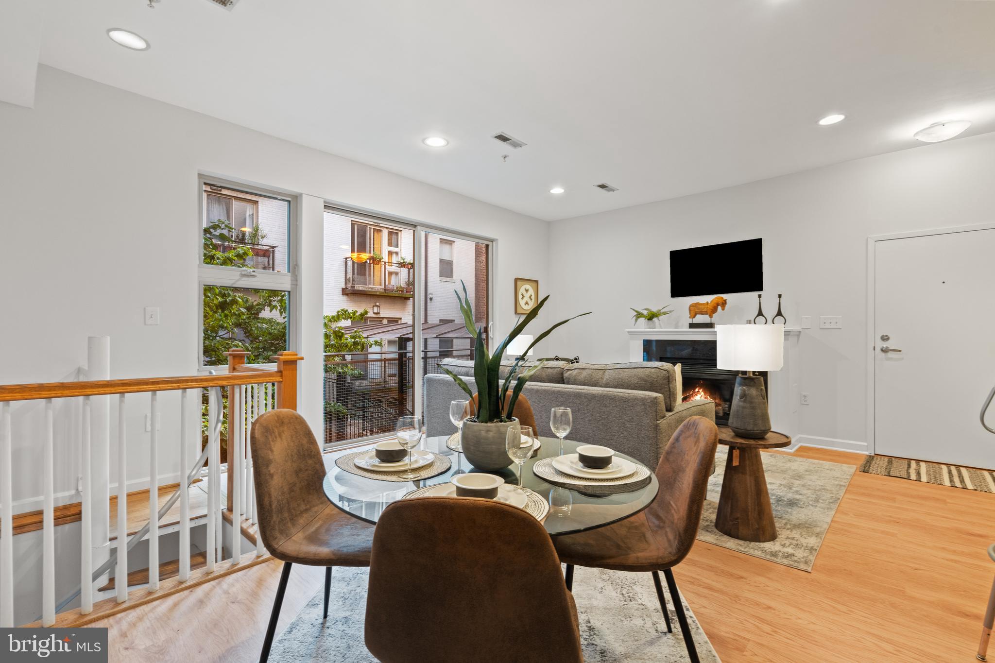 1421 Chapin Street Northwest, Unit 102 Washington, DC 20009 - Photo 11 of 37 a view of a dining room with furniture window and wooden floor