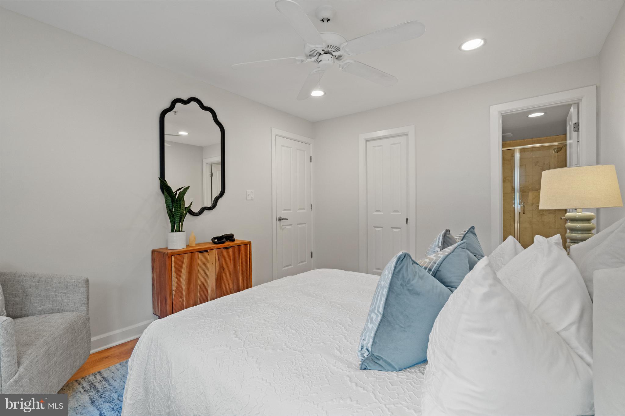 1421 Chapin Street Northwest, Unit 102 Washington, DC 20009 - Photo 14 of 37 a bedroom with bed and window