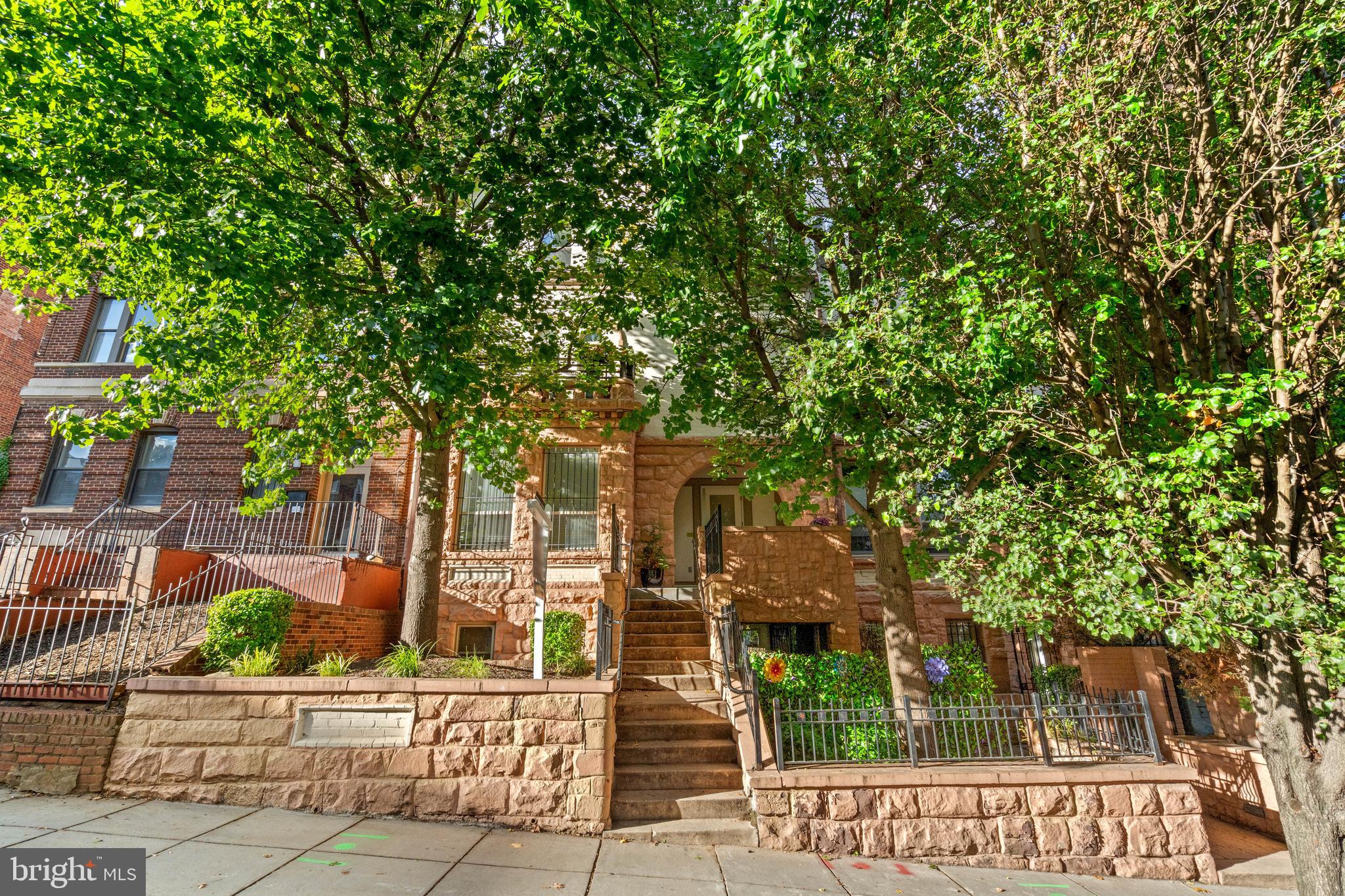 1421 Chapin Street Northwest, Unit 102 Washington, DC 20009 - Photo 26 of 37 a view of a house with a tree