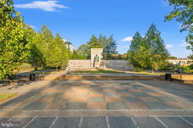 a view of a patio with a yard