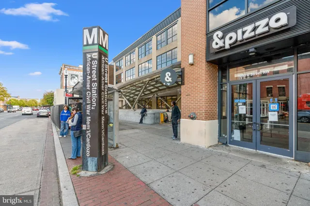 a view of street with sitting area