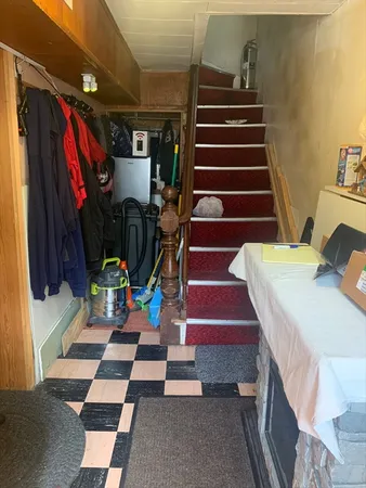 a view of entryway with a front door
