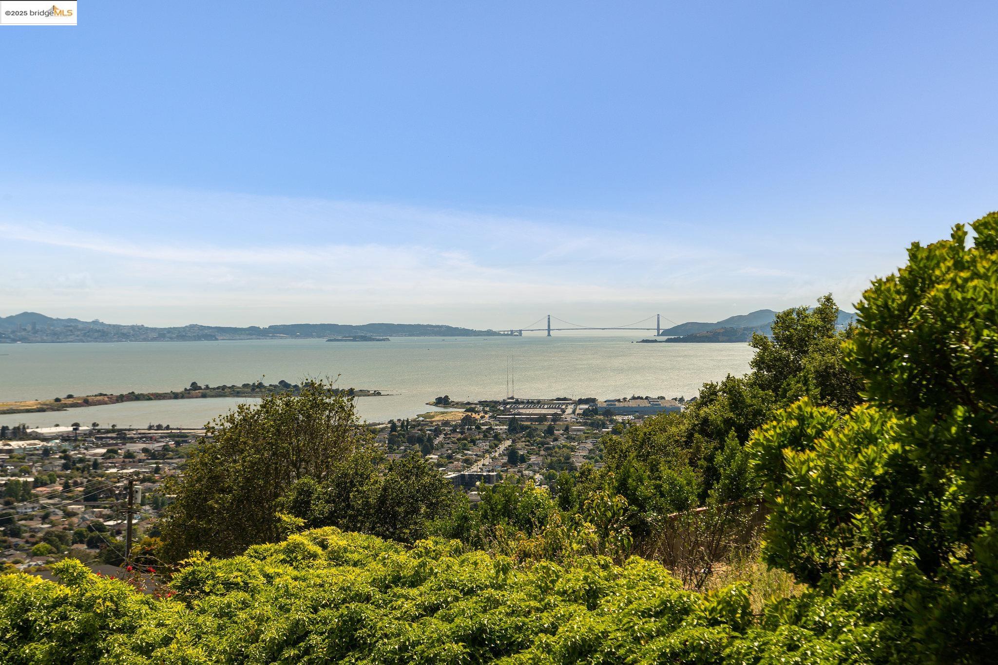 7788 Moeser Lane El Cerrito, CA 94530 - Photo 13 of 25 a view of a lake with a city