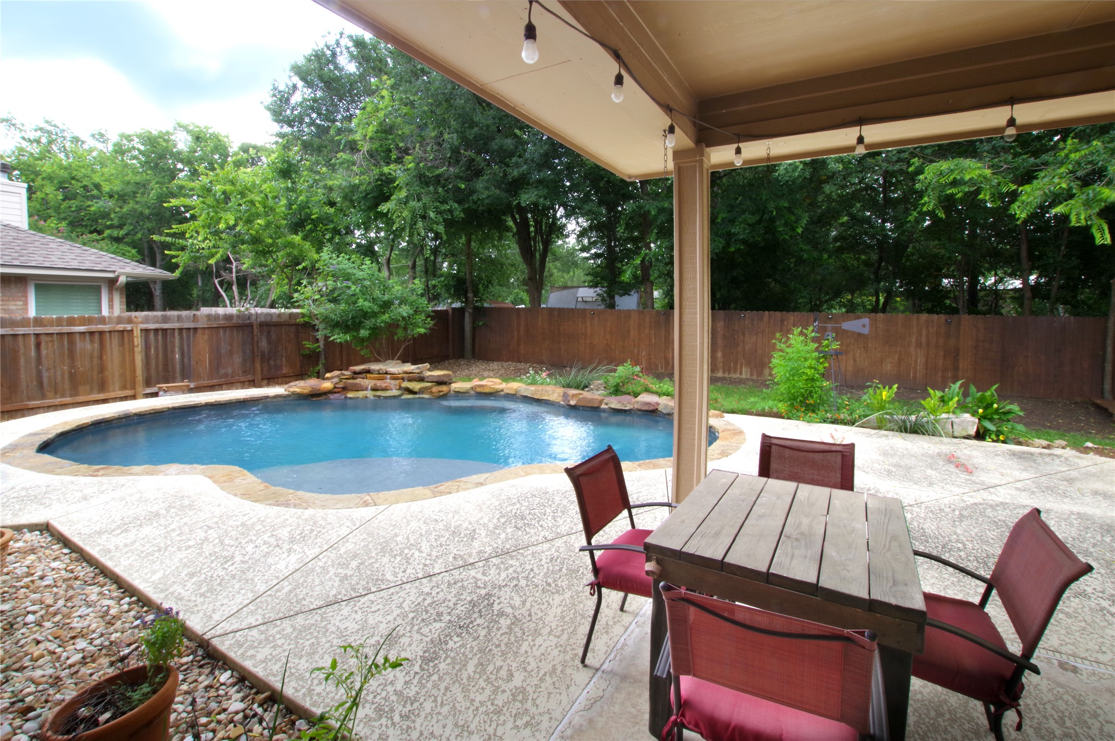 1104 Old Mill Road Cedar Park, TX 78613 - Photo 33 of 40 Covered patio - listen to the waterfall and relax