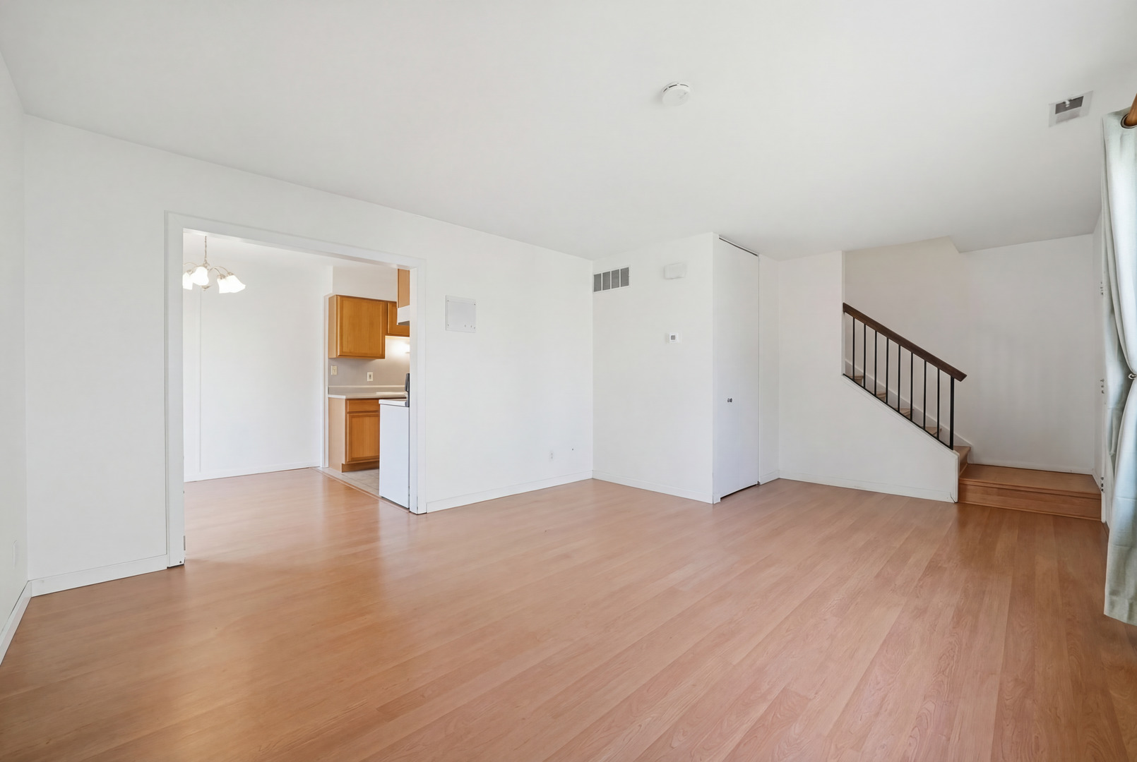 1729 Cedarbrook Court Sycamore, IL 60178 - Photo 14 of 36 a view of an empty room with wooden floor