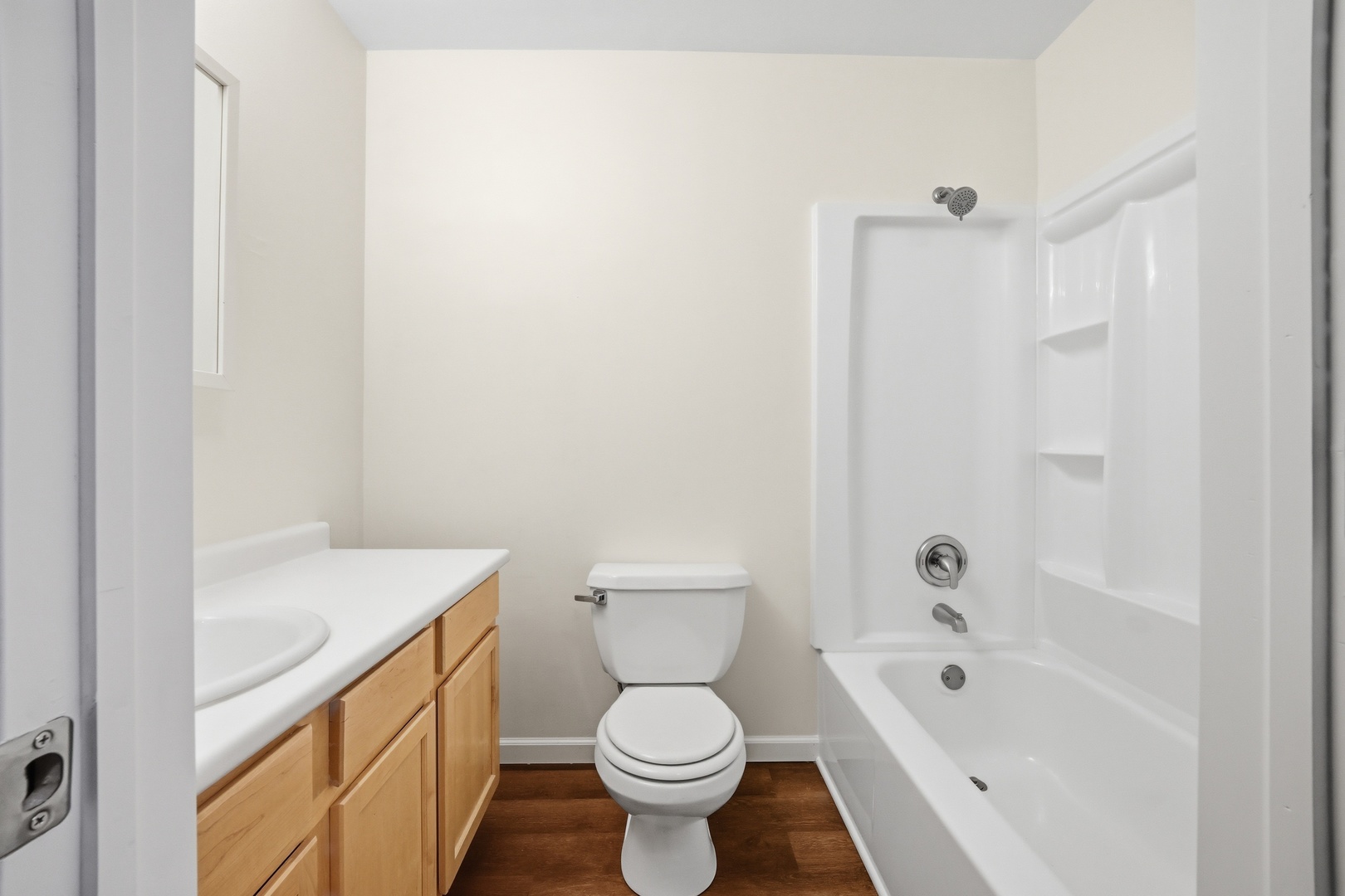 1729 Cedarbrook Court Sycamore, IL 60178 - Photo 23 of 36 a bathroom with a sink a toilet and a bathtub