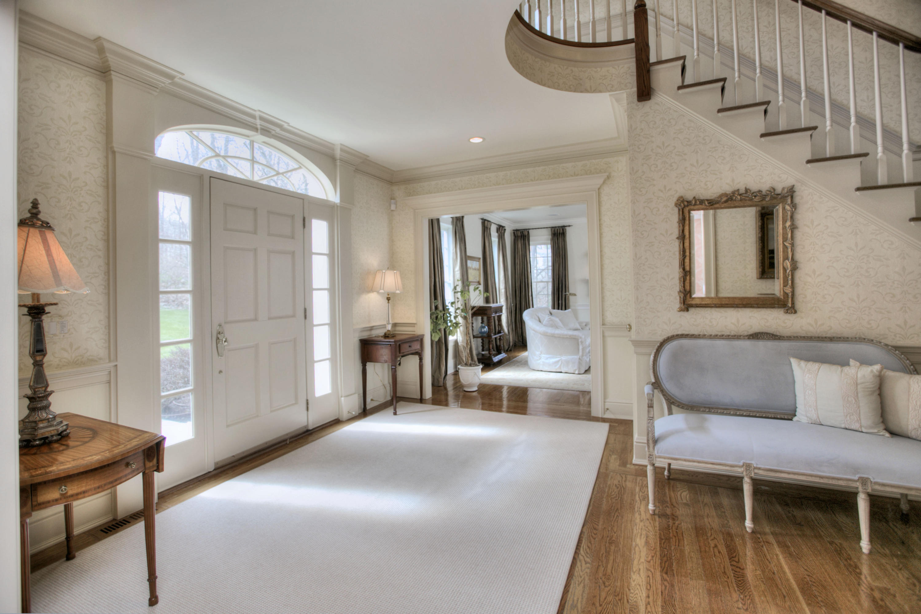 550 Brookside Road New Canaan, CT 06840 - Photo 3 of 32 a bedroom with furniture and a potted plant