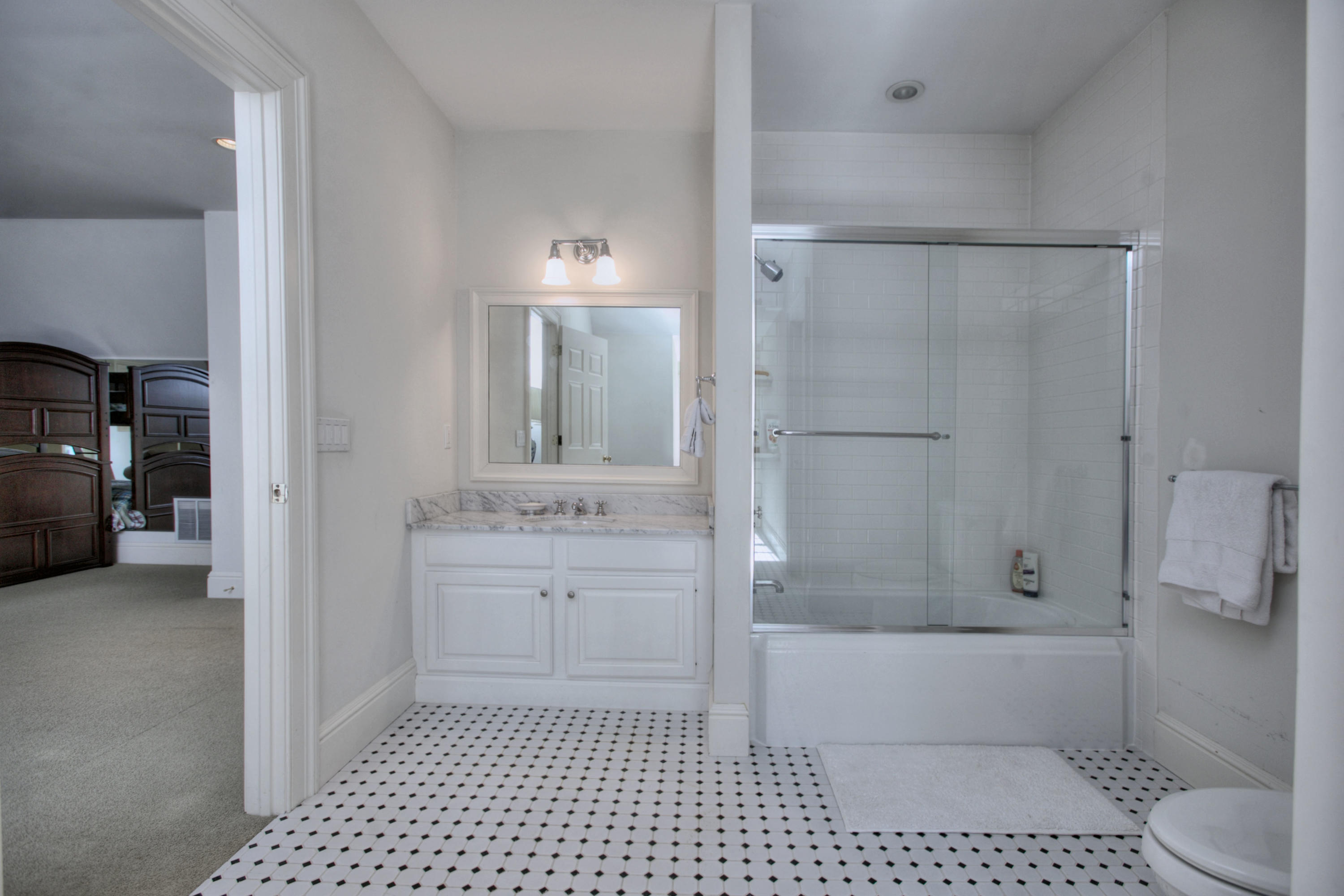 550 Brookside Road New Canaan, CT 06840 - Photo 22 of 32 a bathroom with a shower and a toilet