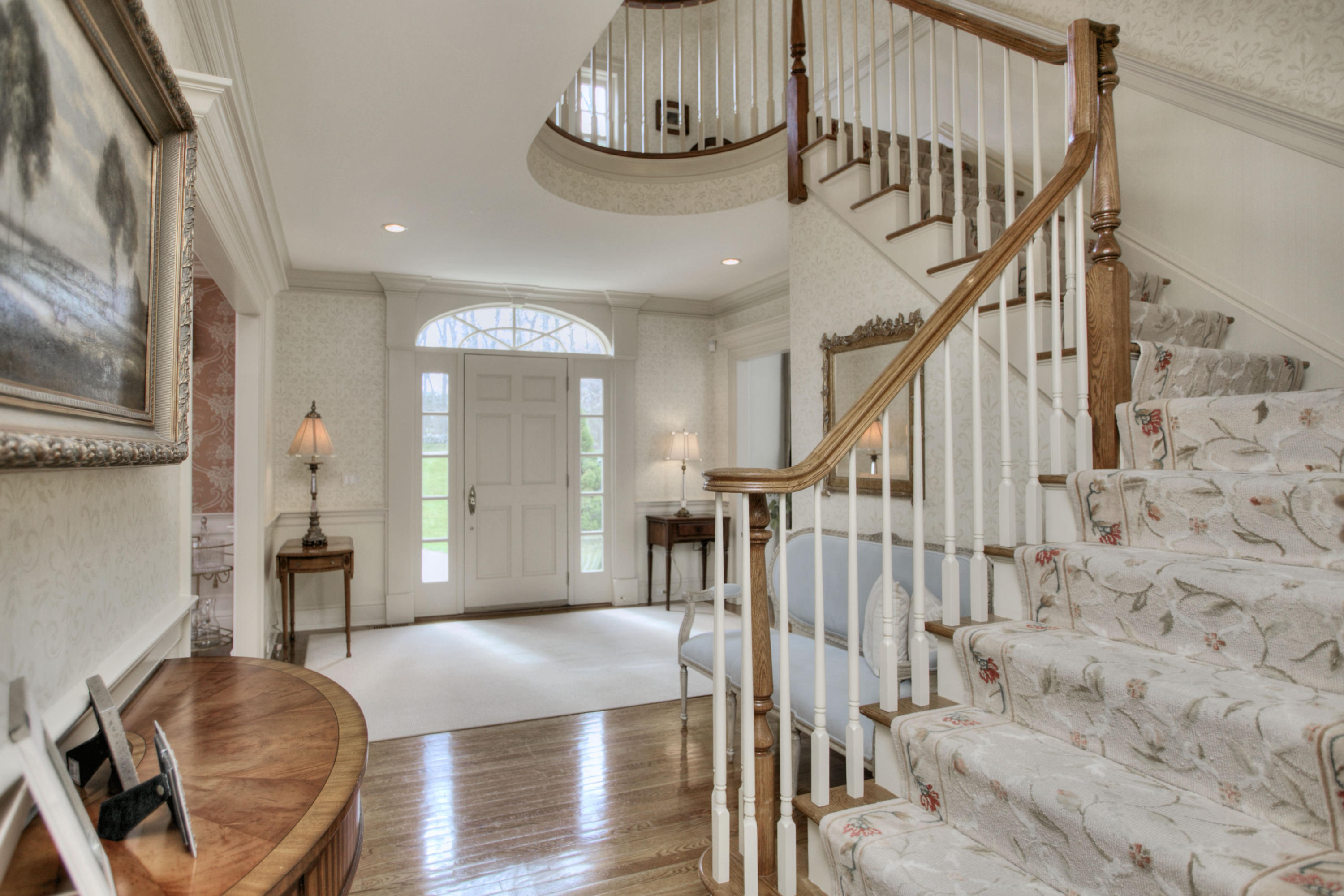 550 Brookside Road New Canaan, CT 06840 - Photo 4 of 32 a view of entryway and hall with wooden floor