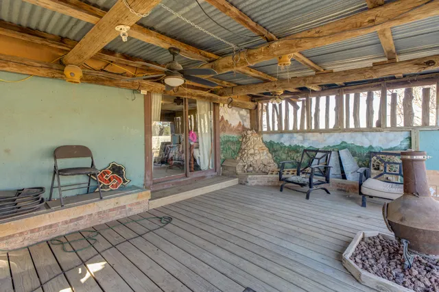 a view of a porch with seating space