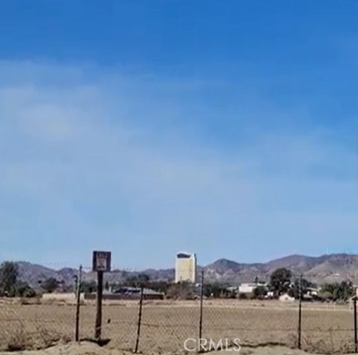 a street sign on a sidewalk