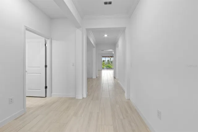 a view of a hallway with closet