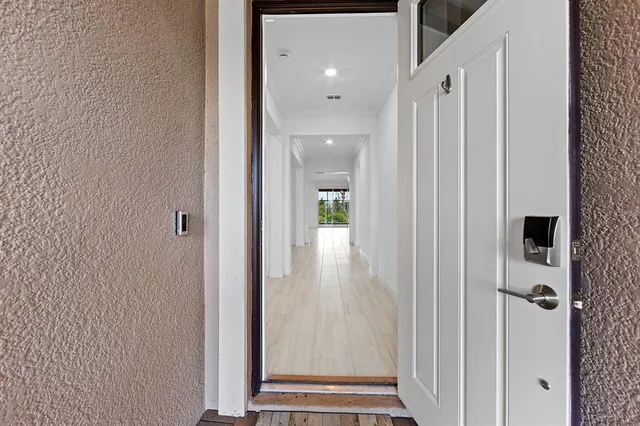 a view of a table and chairs in the garden