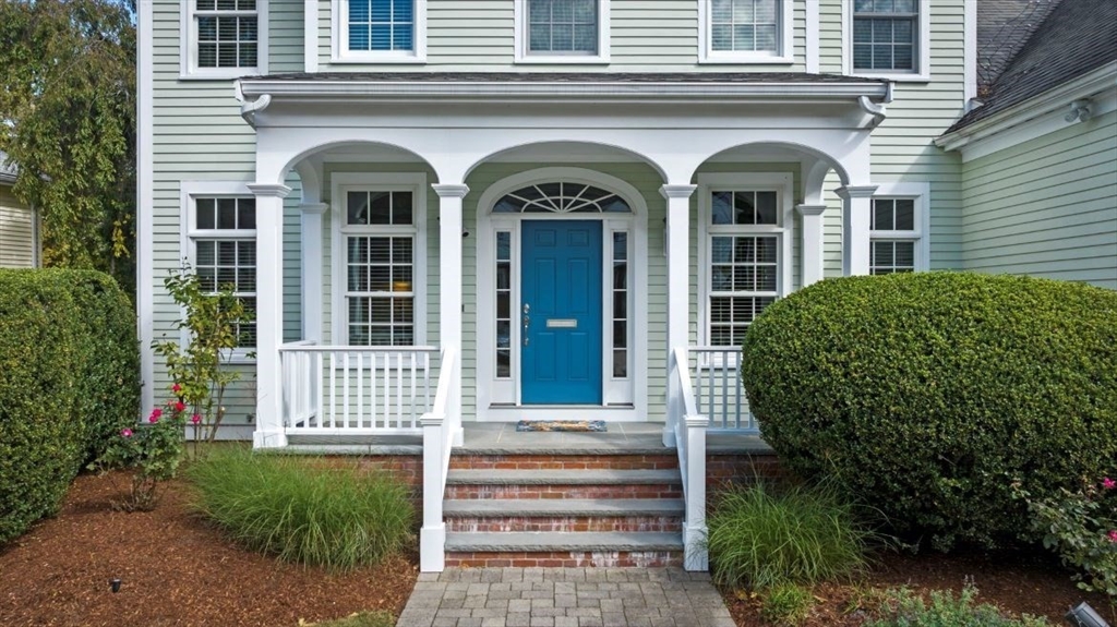 49 Columbia Road Arlington, MA 02474 - Photo 3 of 42 a front view of a house with a garden