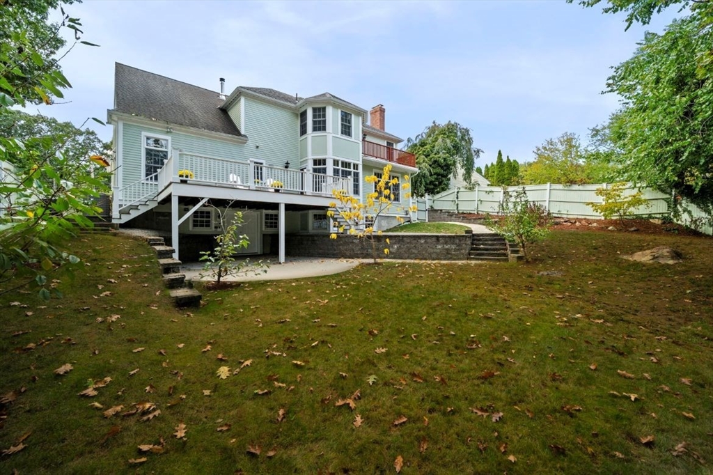 49 Columbia Road Arlington, MA 02474 - Photo 42 of 42 a view of a house with a yard