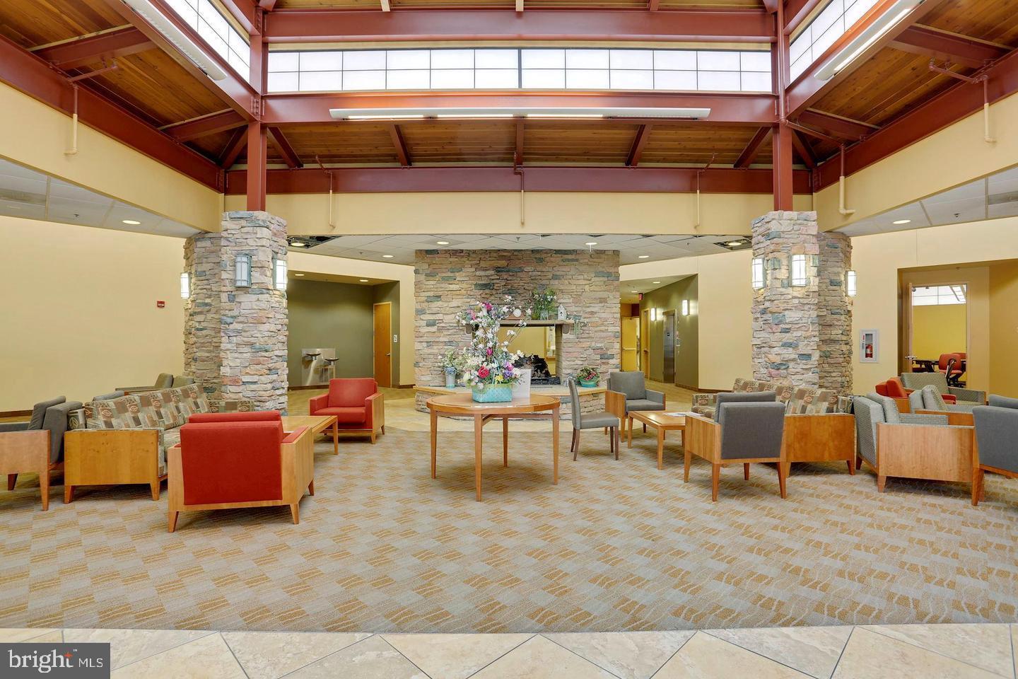 3330 North Leisure World Boulevard, Unit 5109 Silver Spring, MD 20906 - Photo 28 of 44 Inviting communal space with natural light.