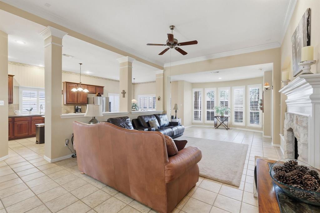 2012 Hayden Lane Corinth, TX 76210 - Photo 12 of 40 a living room with furniture and a fireplace