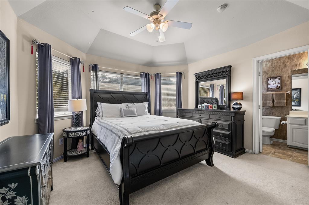 3904 Edna Valley Court Flower Mound, TX 75022 - Photo 27 of 36 a bed room with a bed and furniture