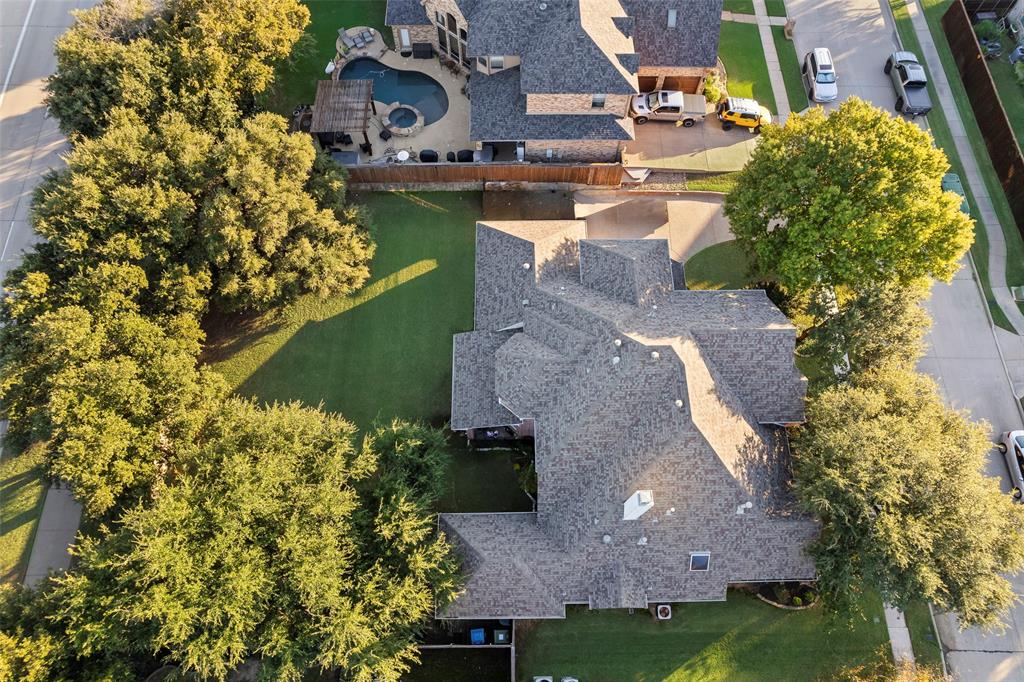 3904 Edna Valley Court Flower Mound, TX 75022 - Photo 33 of 36 an aerial view of a house with a yard