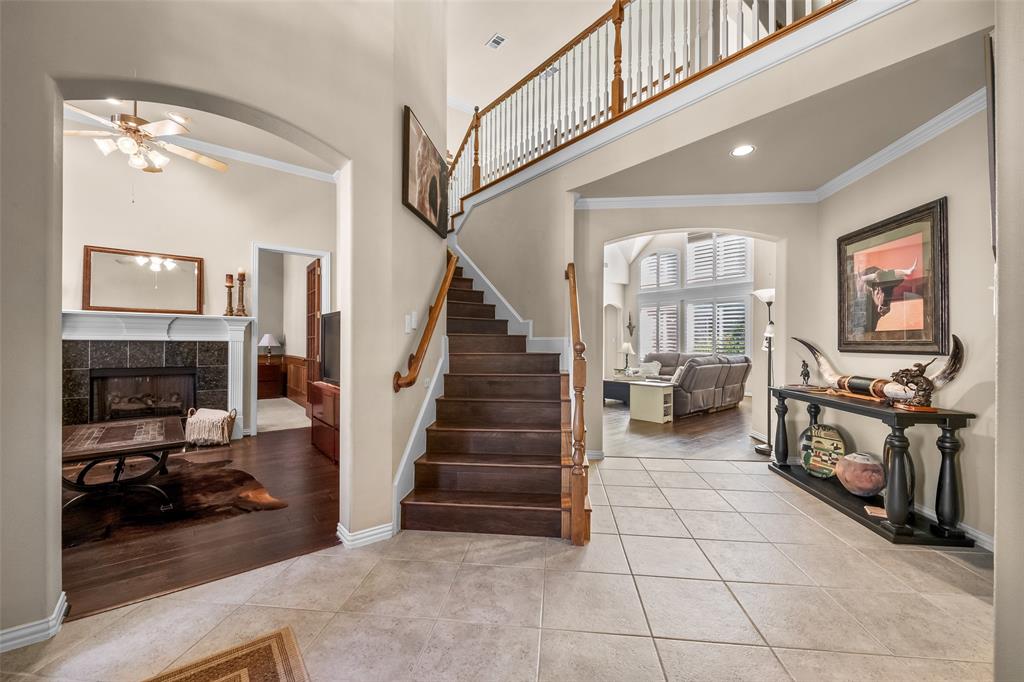 3904 Edna Valley Court Flower Mound, TX 75022 - Photo 4 of 36 a view of a livingroom with furniture and staircase