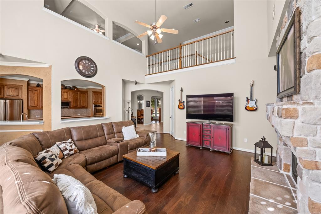 3904 Edna Valley Court Flower Mound, TX 75022 - Photo 10 of 36 a living room with furniture and a flat screen tv