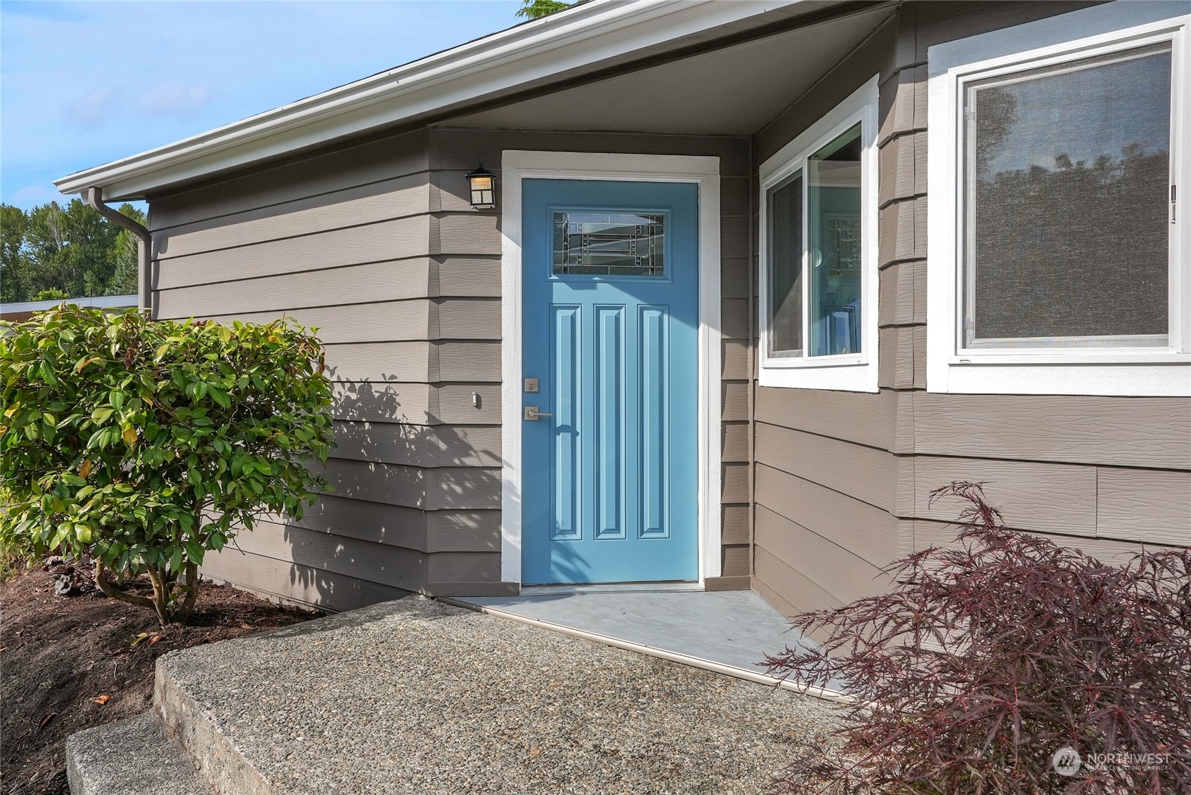 23730 Vista View Avenue Bothell, WA 98021 - Photo 2 of 3 a front view of a house with a yard
