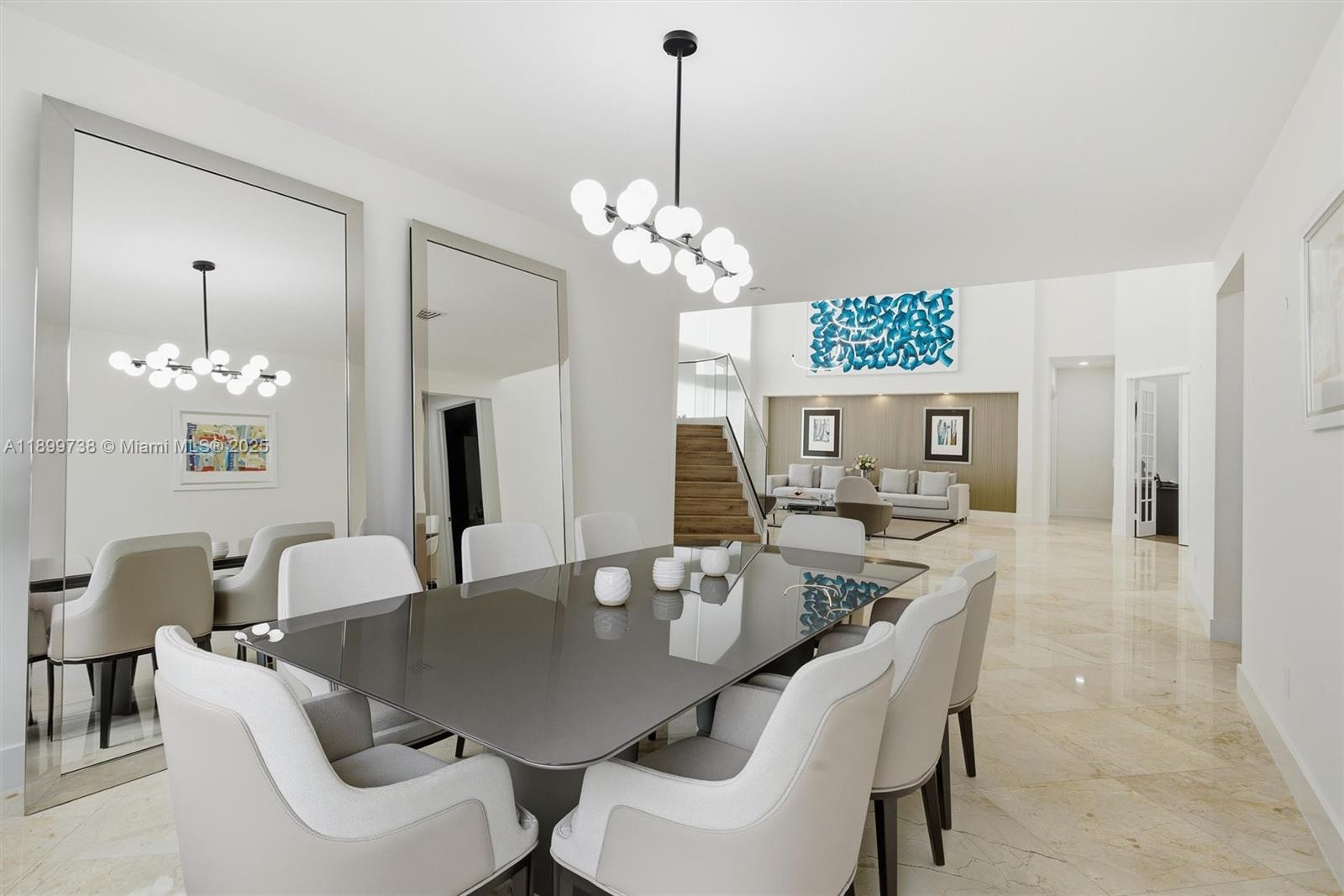 3526 Juniper Lane Davie, FL 33330 - Photo 13 of 79 a view of a dining room with furniture and chandelier