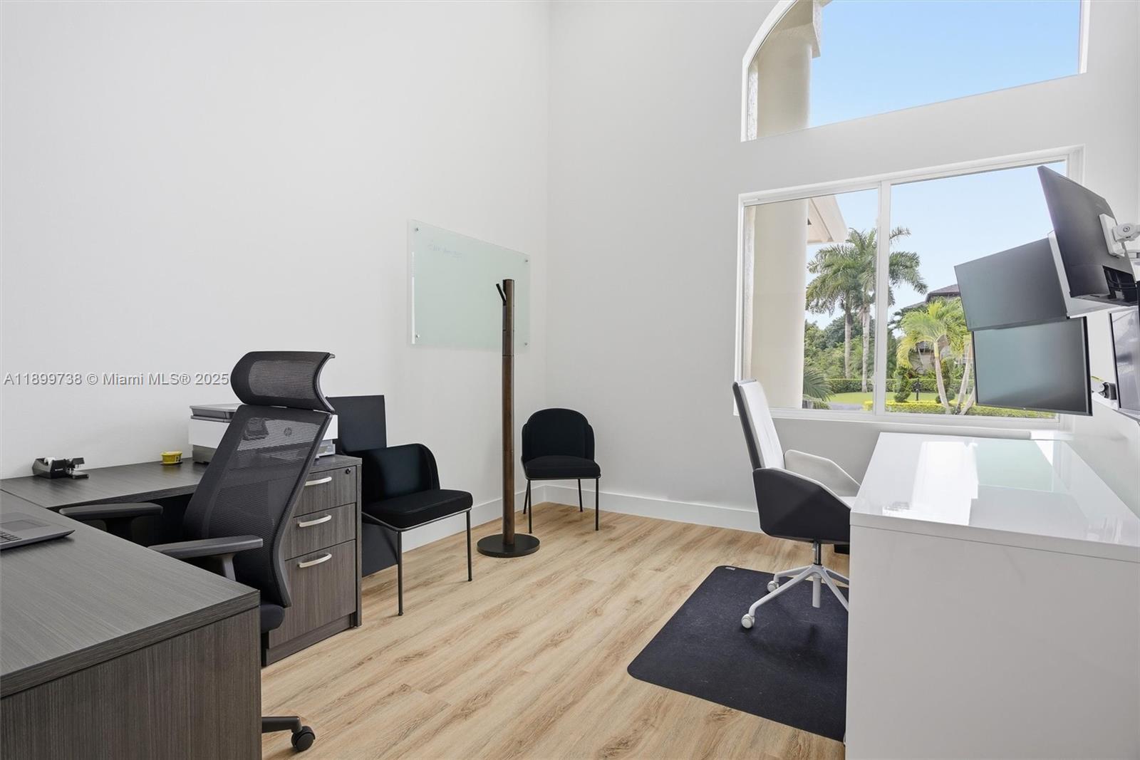 3526 Juniper Lane Davie, FL 33330 - Photo 15 of 79 a view of workspace with wooden floor windows