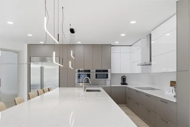 a large bathroom with a granite countertop sink mirror and a