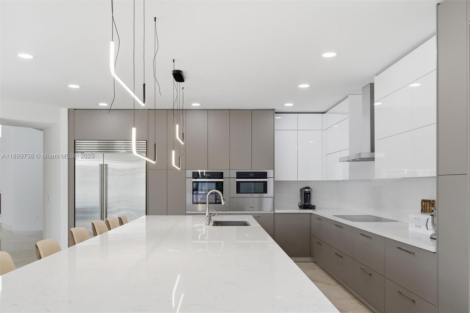 3526 Juniper Lane Davie, FL 33330 - Photo 20 of 79 a large white kitchen with a large window