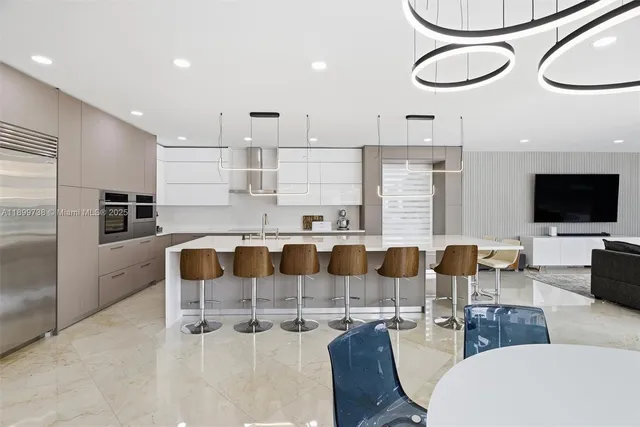 a spacious bathroom with a granite countertop sink mirror and a