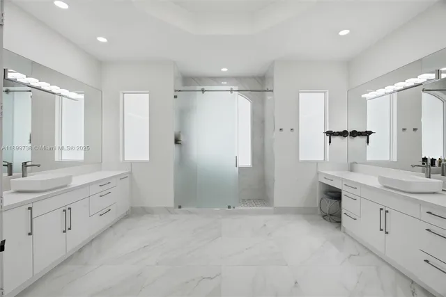 a bathroom with a sink toilet and vanity