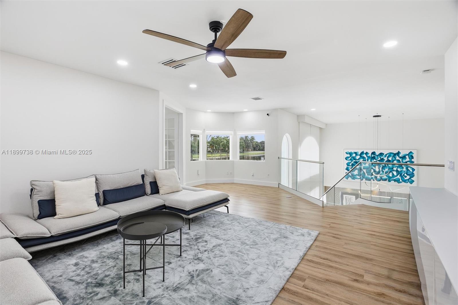 3526 Juniper Lane Davie, FL 33330 - Photo 36 of 79 a living room with furniture and a large window