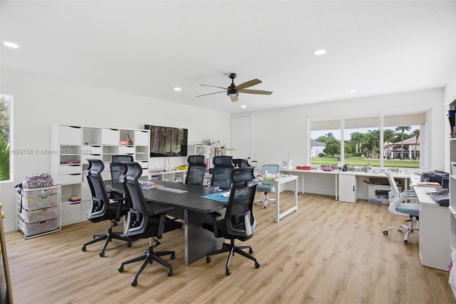 3526 Juniper Lane Davie, FL 33330 - Photo 38 of 79 a view of a workspace with furniture and a window