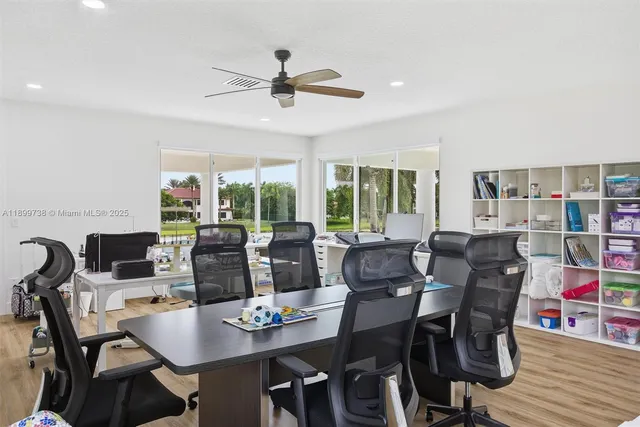 a front view of a house with a yard table and chairs