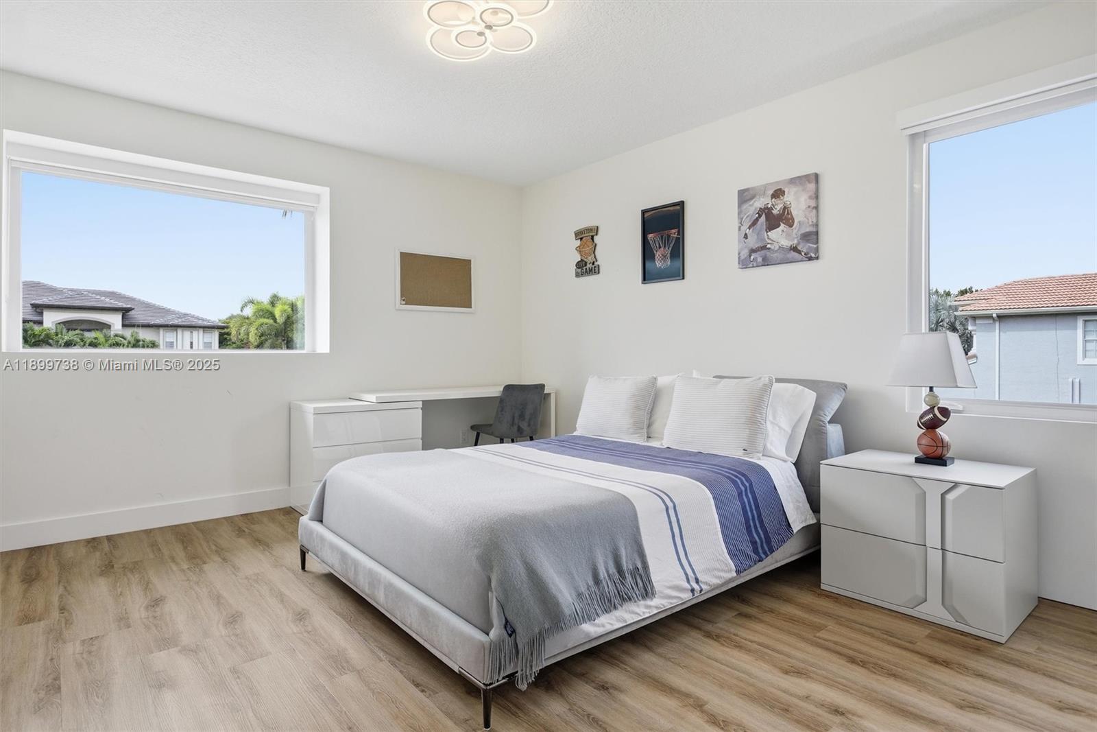 3526 Juniper Lane Davie, FL 33330 - Photo 40 of 79 a bedroom with a bed and a window