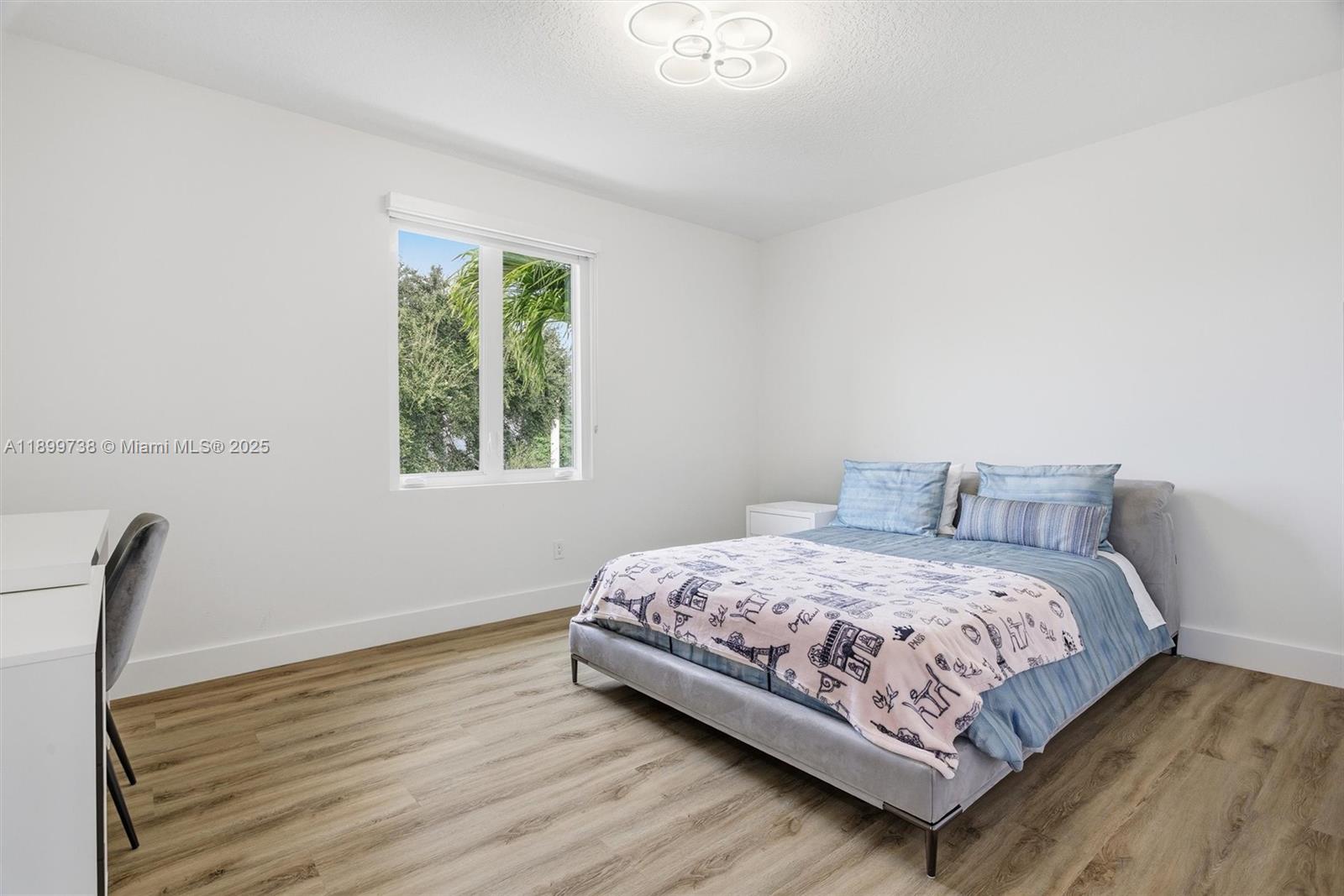 3526 Juniper Lane Davie, FL 33330 - Photo 43 of 79 a bedroom with a bed and a window