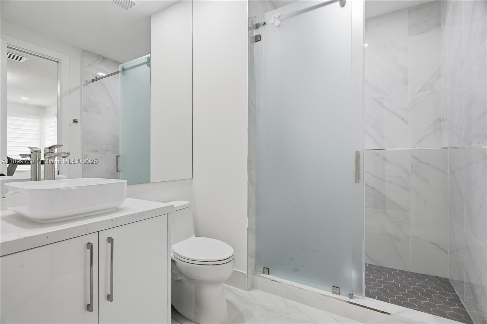 3526 Juniper Lane Davie, FL 33330 - Photo 48 of 79 a bathroom with a sink a toilet and shower